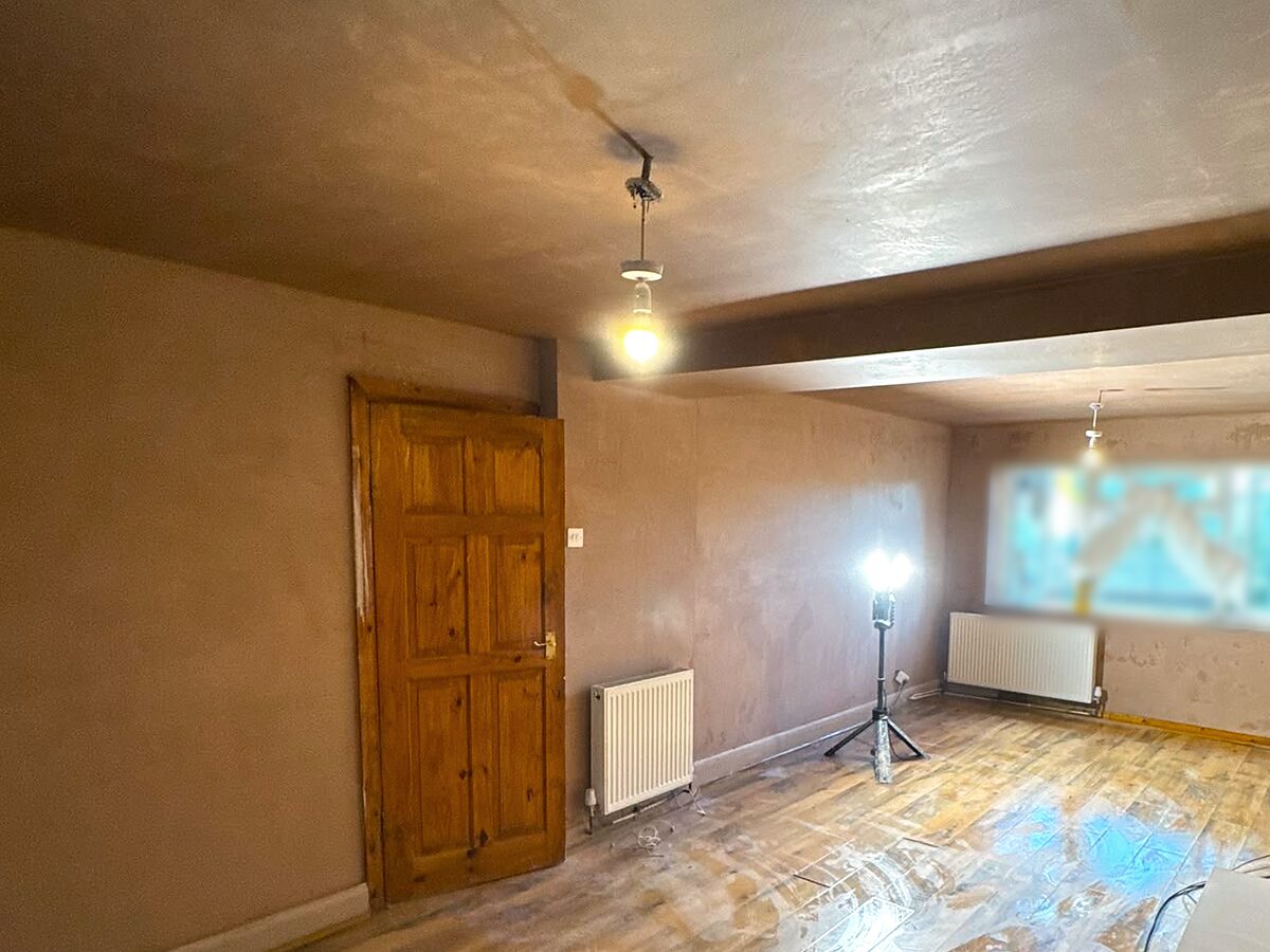 Long through-room with freshly skimmed walls and ceiling